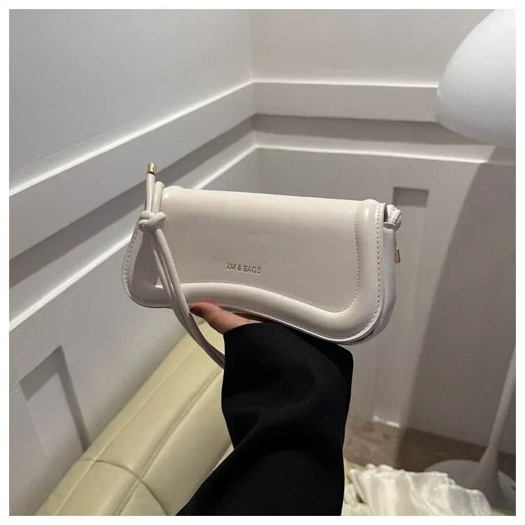 The Ivory Curve Shoulder Bag