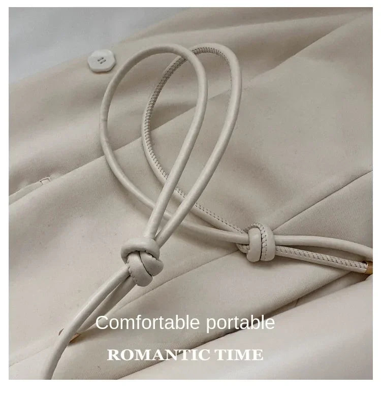 The Ivory Curve Shoulder Bag