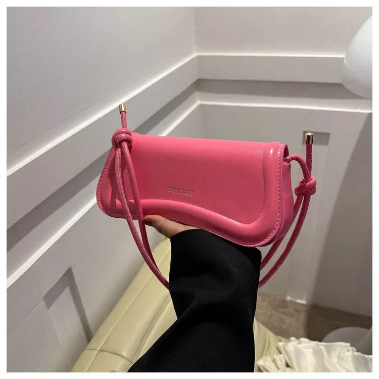 The Ivory Curve Shoulder Bag