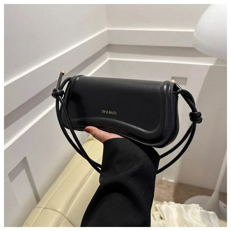 The Ivory Curve Shoulder Bag